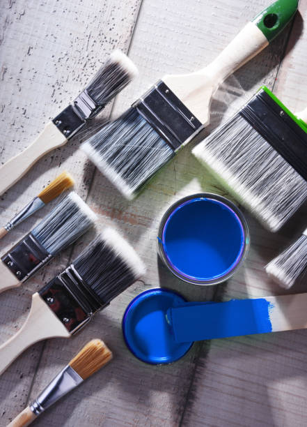istock Paintbrushes of different size and paint can 1202080753