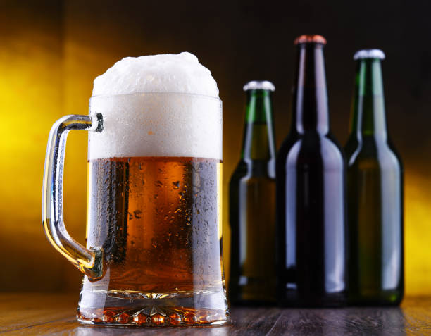 istock Composition with glass and bottles of beer 1202082746