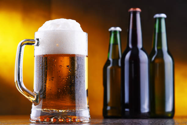 istock Composition with glass and bottles of beer 1202082761