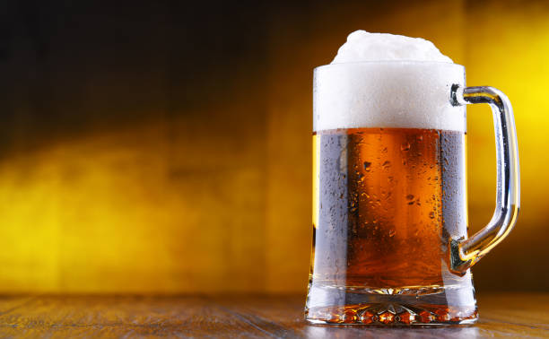 istock Composition with glass of draught beer 1202082910