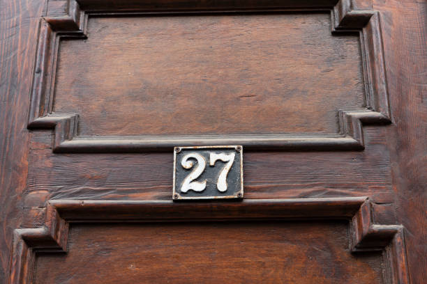 istock The number 27 on a brick wall. 1202083015
