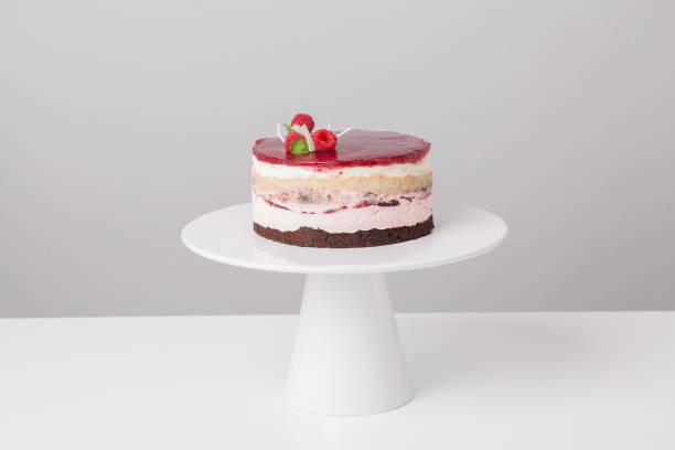 istock close up of conceptual fruit cake on gray background 1202083339