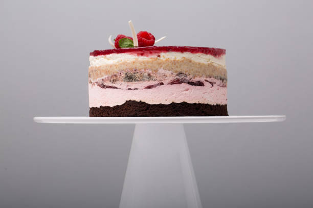 istock close up of conceptual fruit cake on gray background 1202083350