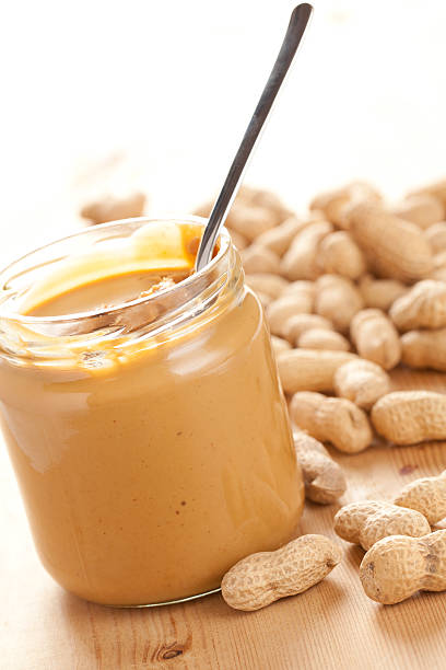 istock A spoon in a jar of peanut butter 120208425