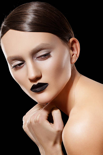 istock High fashion model with dark lips make-up & shiny hairstyle 120208547