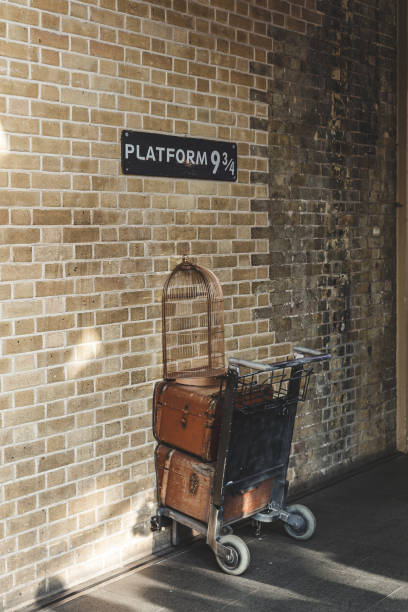 London/UK-26/07/18: Platform 9 3/4. The ride on the Hogwarts Express starts from King's Cross railway station platform â9 3â4, which is hidden and reached by walking through the barrier between platforms 9 and 10