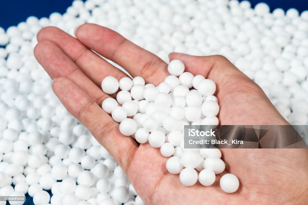 Hand Holding White Polystyrene Foam Beads Stock Photo - Download Image Now  - Abstract, Bead, Black Color - iStock