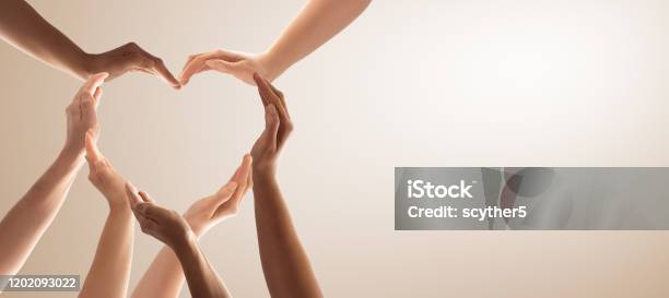 The Concept Of Unity Cooperation Teamwork And Charity Stock Photo - Download Image Now