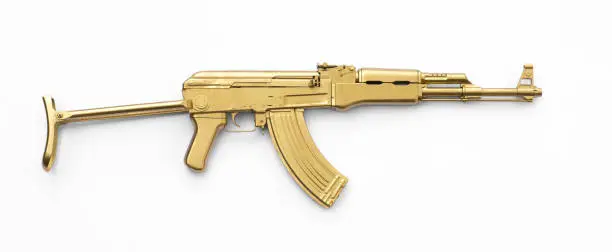 Photo of golden AK-47 assault rifle isolated on white background