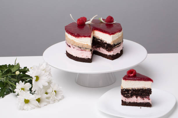 istock close up of conceptual fruit cake on gray background 1202094932