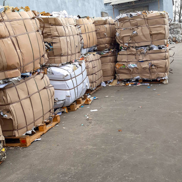 istock mucolatura pressed into bales, stacked in a stack. waste paper 1202096969