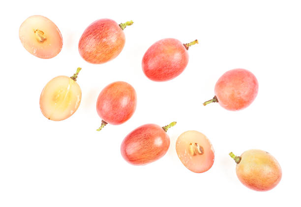 istock Fresh pink grapes on a white background, top view. 1202097181