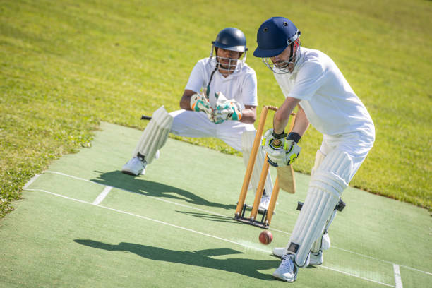 istock Cricket batsman moments before hitting the ball 1202097511