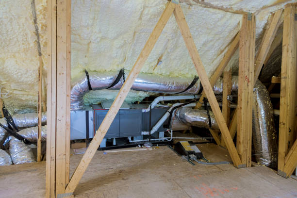 istock Air conditioning system attached to attic termal foam plastic insulation new home attic installation of heating system on the roof 1202098723