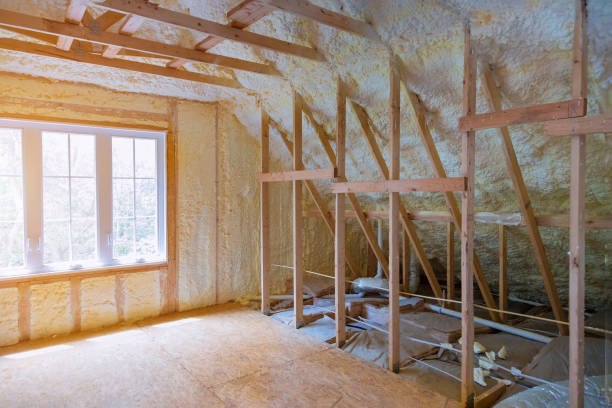 Thermal insulation a new house under the roof of air conditioning on the roof Thermal insulation a new house under the roof of air conditioner vents in new home construction on the roof attic photos stock pictures, royalty-free photos & images