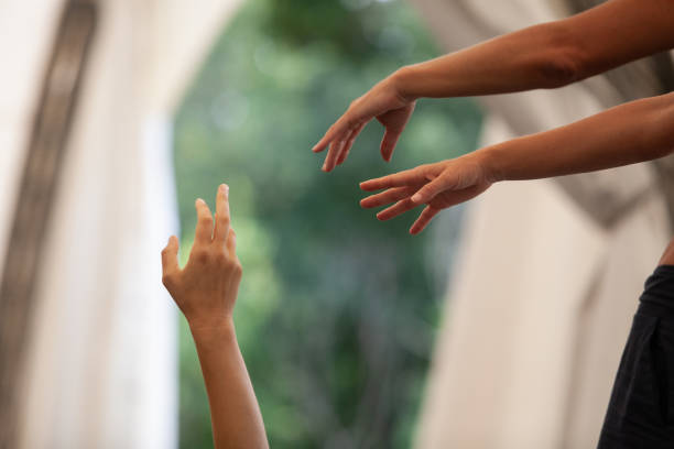 dancer hand, contemporary dance performance, contact improvisation dancer hand, contemporary dance performance, contact improvisation contemporary dance stock pictures, royalty-free photos & images