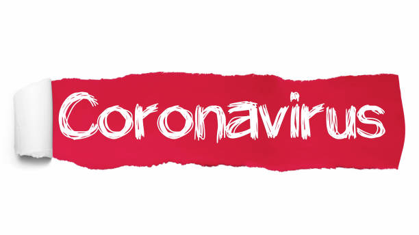 istock The text Coronavirus written under the curled piece of Red torn paper 1202099553