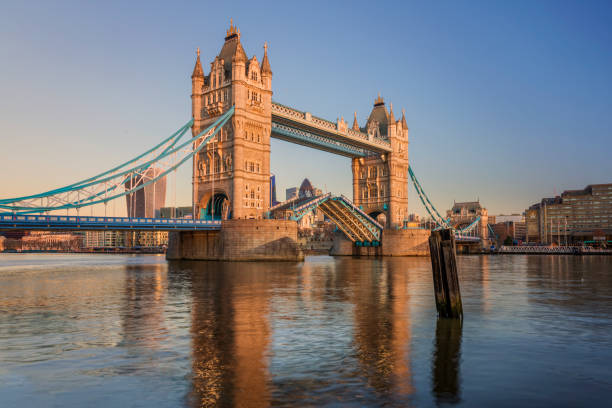 istock London Tower Bridge Open at River Thames at Sunrise 1202100816