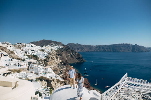 istock The couple is standing on the white roof 1202100927