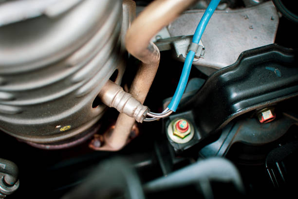 Oxygen sensor O2 in the exhaust pipe. Oxygen sensor O2 in the exhaust pipe for calculating the ingredients in the engine system. Oxygen stock pictures, royalty-free photos & images