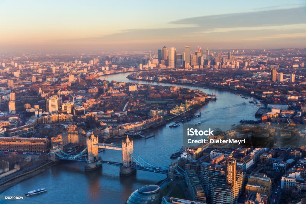 Aerial view of Tower Bridge and Canary Wharf skyline at sunset London - England, England, Europe, UK, Urban Skyline London - England Stock Photo