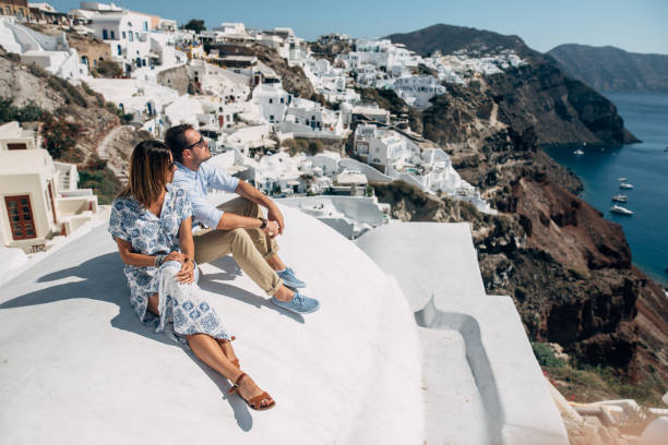istock The couple is sitting on the white roof 1202102355