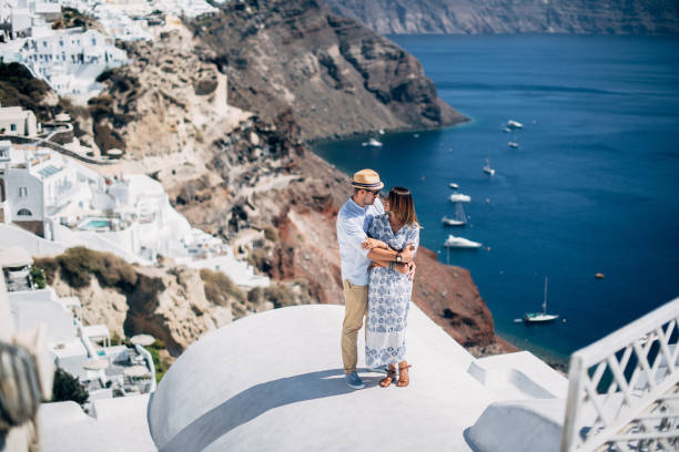 istock The couple is standing on the white roof 1202102697