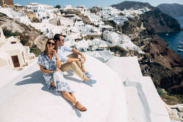 istock The couple is sitting on the white roof 1202102718