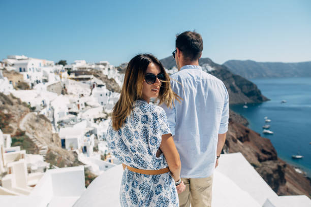 istock The couple is standing on the white roof 1202103620