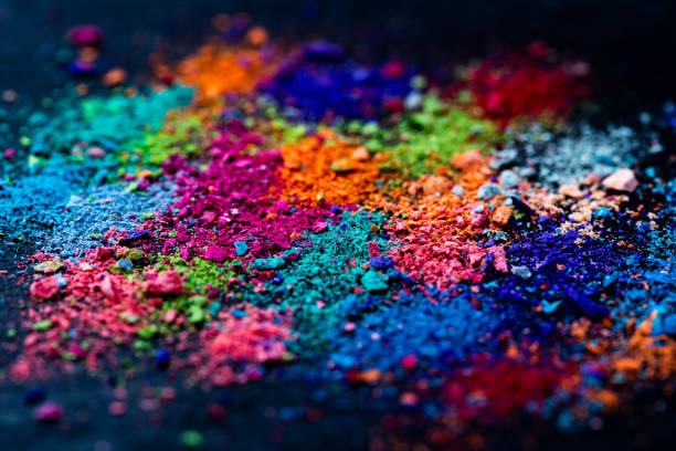 Crumbs of multi-colored chalk on a black background. Joy, Carnival. Panorama. A game for children. Art Crumbs of multi-colored chalk on a black background. Joy, Carnival. Panorama. A game for children. Art. artists palette photos stock pictures, royalty-free photos & images