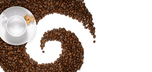 cup of coffee surrounded by coffee bean Roasted coffee beans isolated on a white backgound tasse café stock pictures, royalty-free photos & images