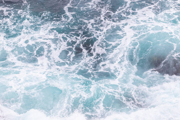 istock Ocean coast, moviment waves with foam. Wind power. Turquoise water. 1202105065