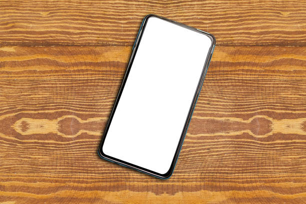 istock Mobile smartphone on wooden table 1202105091