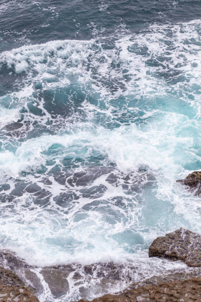 istock Ocean coast, moviment waves with foam. Wind power. Turquoise water. 1202105111