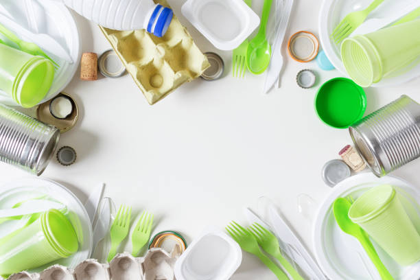 istock Group of garbage for recycling. Frame from segregated metal, disposable plastic and paper. 1202117395