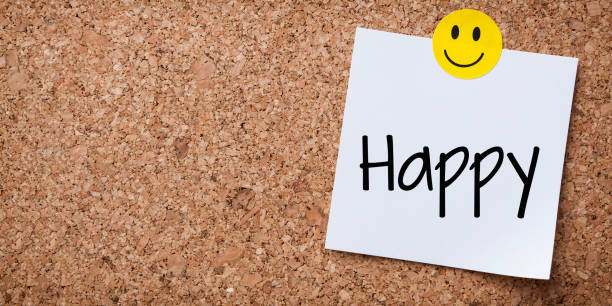 istock White Sticky Note With Happy And Red Push Pin On Cork Board 1202117681