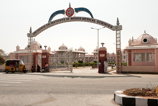 Puttaparthi, Andhra Pradesh, India - January 11, 2013: Entrance of the Sri Sathya Sai Institute of Higher Medical Sciences, care medical centre based in Prasanthigram by Sai Baba in Puttaparthi, India