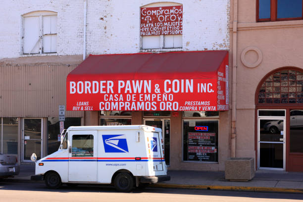 USPS delivery vehicle outside the Border Pawn and coin store on N Grand Ave in Nogales, AZ USPS delivery vehicle outside the Border Pawn and coin store on N Grand Ave in Nogales, AZ nogales arizona stock pictures, royalty-free photos & images