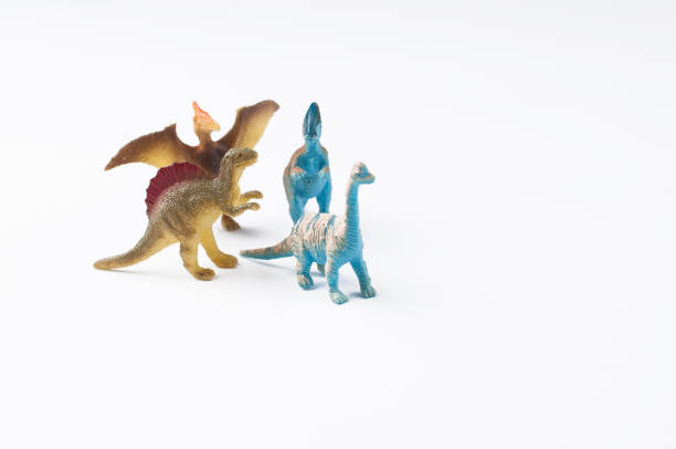 istock Toy dinosaurs isolated on white background.Copy space. 1202123153