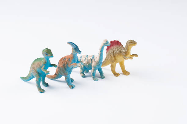 istock Toy dinosaurs isolated on white background.Copy space. 1202123173