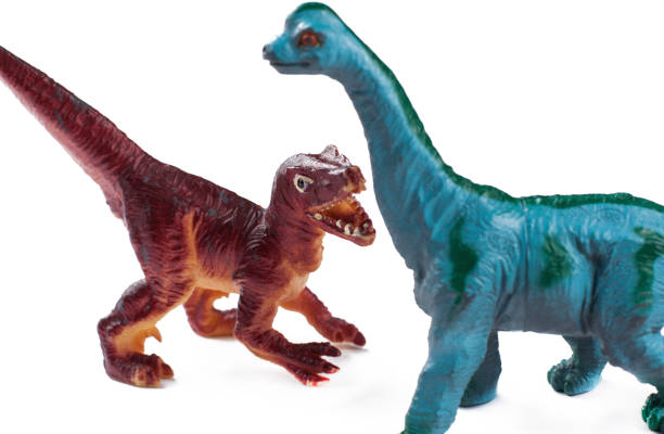 istock Toy dinosaurs isolated on white background.Copy space. 1202123694