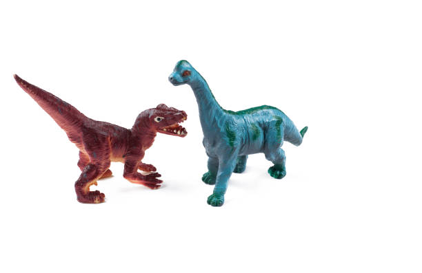 istock Toy dinosaurs isolated on white background.Copy space. 1202123702