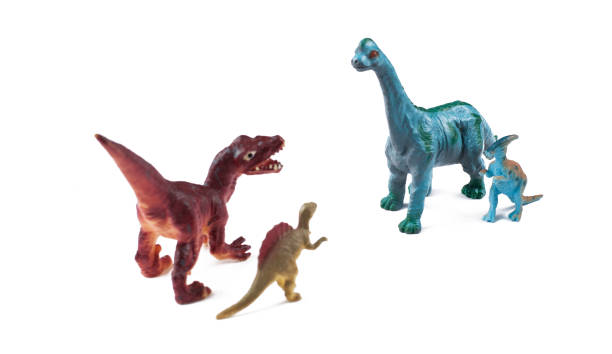 istock Toy dinosaurs isolated on white background.Copy space. 1202123704