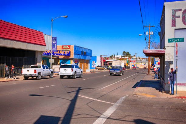 View of North Grand Ave in the US-Mexican border city of Nogales, AZ View of North Grand Ave in the US-Mexican border city of Nogales, AZ nogales arizona stock pictures, royalty-free photos & images
