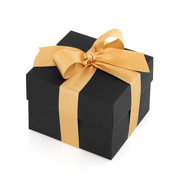 A black gift box with a golden bow