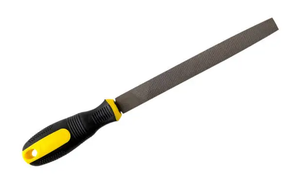 Photo of Flat steel file with yellow black rubber handle isolated on white background. Rasp tool for processing of wood and metals. Repair and construction.