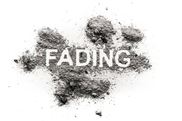 istock Fading word written in ash, dust, filth 1202124995
