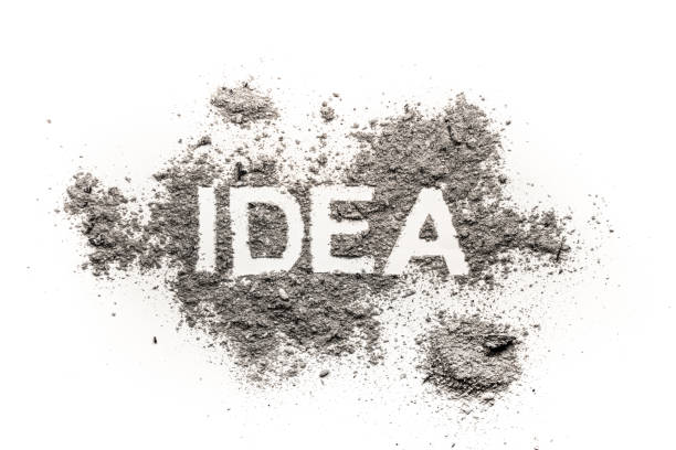 istock Idea word written in ash, dust, filth or dirt 1202125089