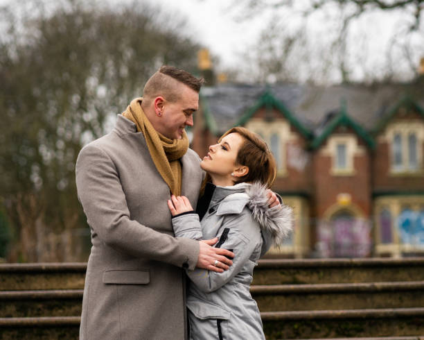 istock Loved up Couple in the Park 1202127067