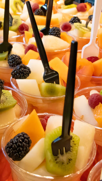 istock Sliced fresh fruit cup as a fast snack at the Market 1202128245